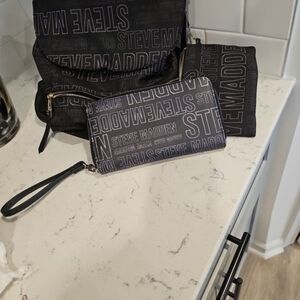 Steve Madden Black and Gray Back Pack with a Pouch attached and a wristlet